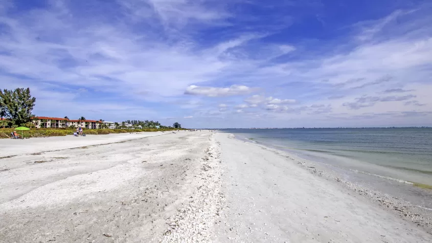 Beach area in front of at Sanibel Arms West Condos